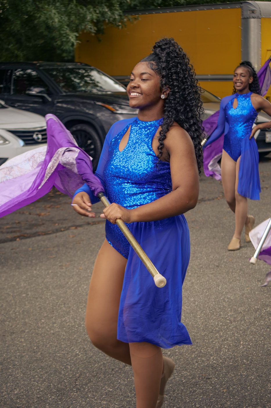 A twirler performing with a baton