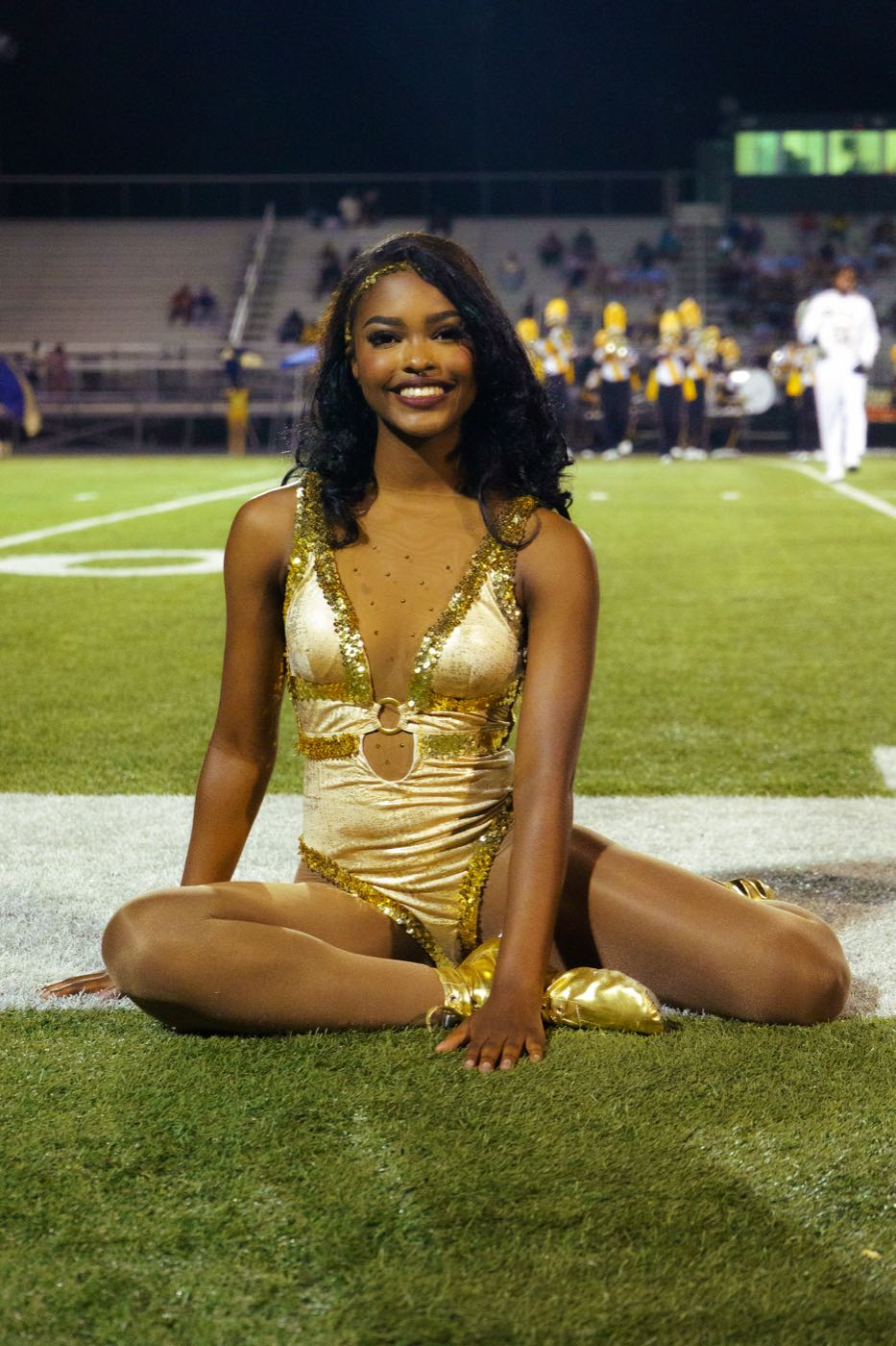 A Blue Satin dancer at a home football game
